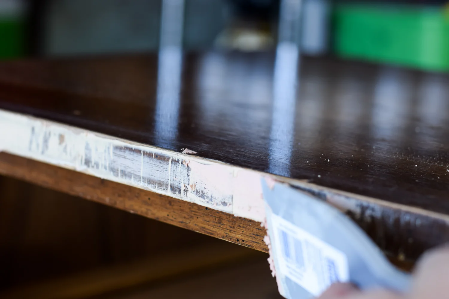 sanding a piece of furniture smooth